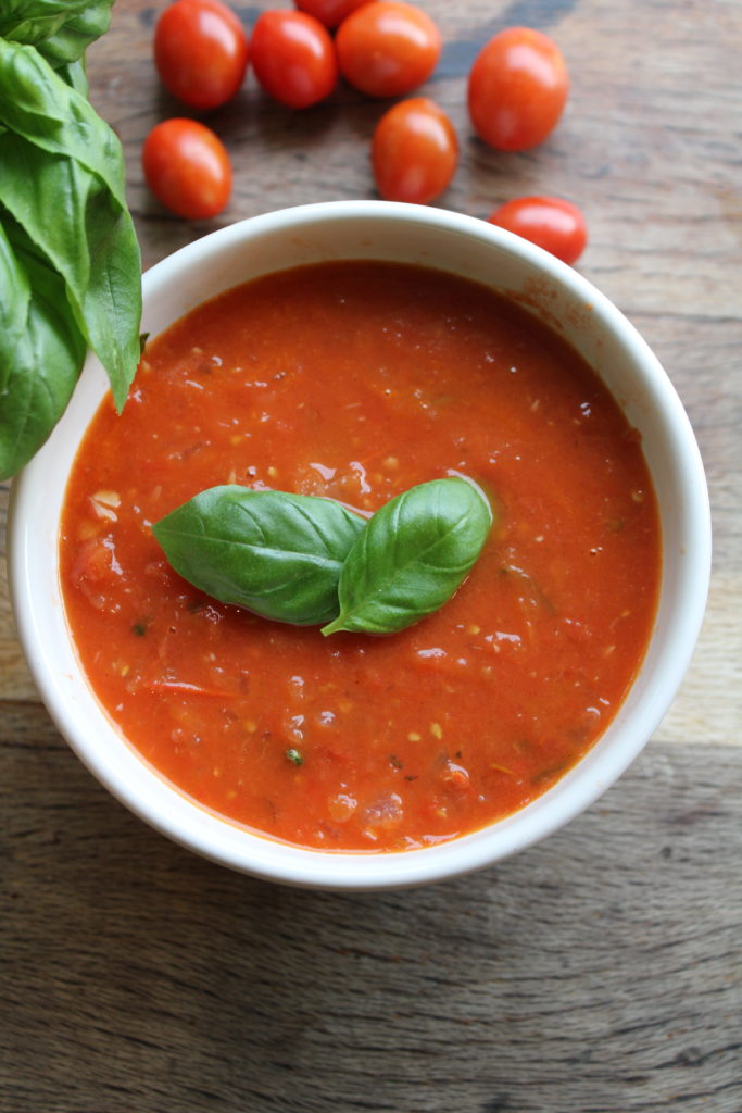 a bowl of simple fresh roasted marinara sauce on the counter 