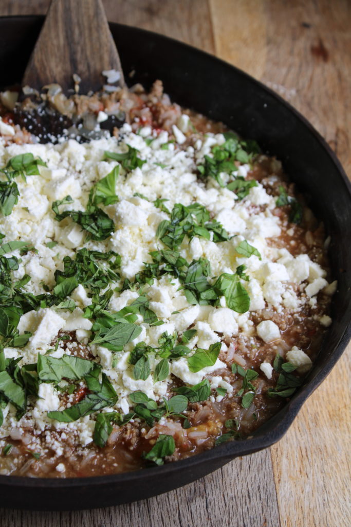 showing how to mix up the filling for stuffed bell peppers