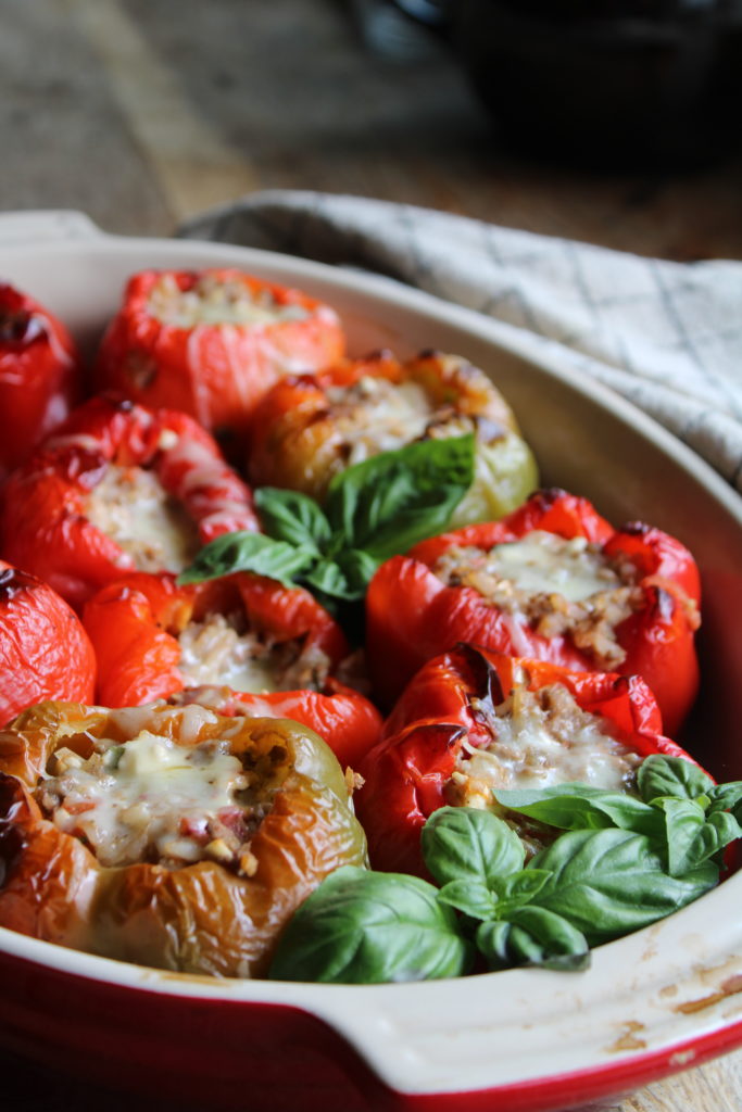 stuffed bell peppers in a casserole dish